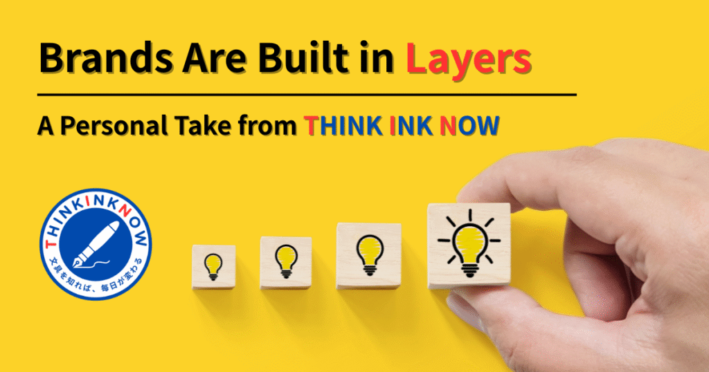 A visual metaphor showing brand growth in layers, with wooden blocks and a THINK INK NOW logo